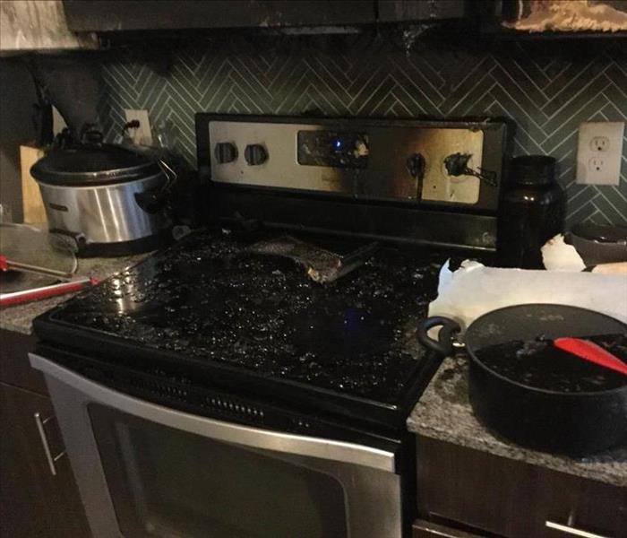 Fire damaged stove.